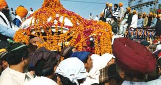 Sikhs attend birthday celebrations of Baba Guru Nanak 